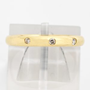 18 carat gold band with diamonds