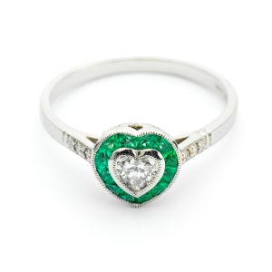 Emerald and diamond heart-shaped ring