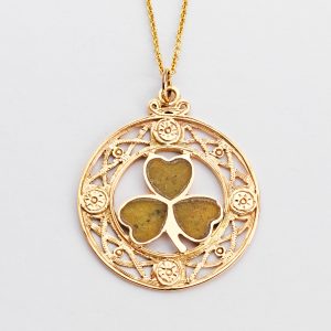 Gold shamrock pendant