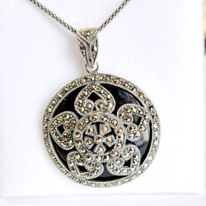 Onyx and marcasite silver pendant