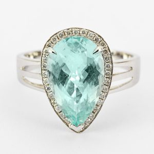 Pear shaped aqua and diamond cluster